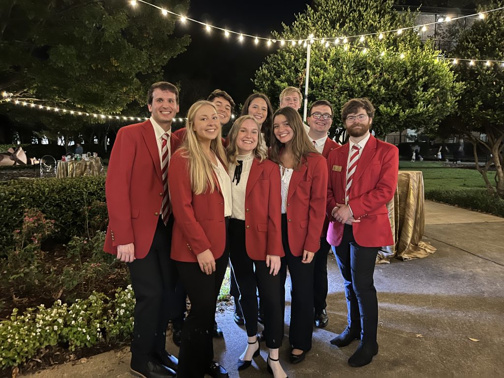 Ambassadors at a nighttime event on campus